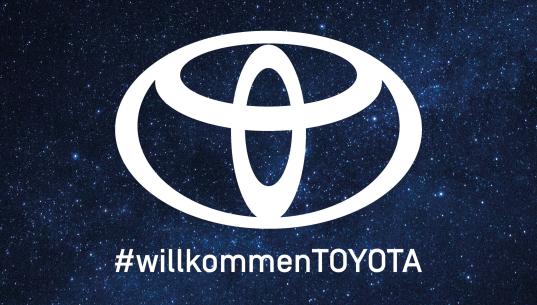 Toyota Logo mit Spruch Willkommen Toyota in der Autobahn-Garage Lyss